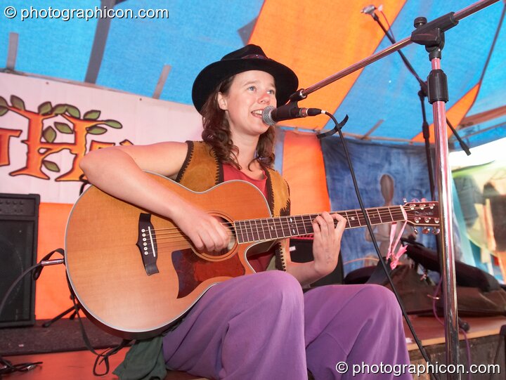 A singer performs on the Eartheart stage at Big Green Gathering 2006. Burrington, Cheddar, Great Britain. © 2006 Photographicon