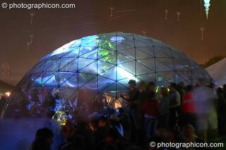 The exterior of the transparent idSpiral dome (Dance Village) by night at Glastonbury Festival 2005. Pilton, Great Britain. © 2005 Photographicon