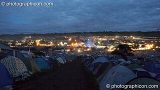 Night view of Glastonbury Festival 2007 taken from the the camping hill above the pyramid stage. Pilton, United Kingdom. © 2007 Photographicon