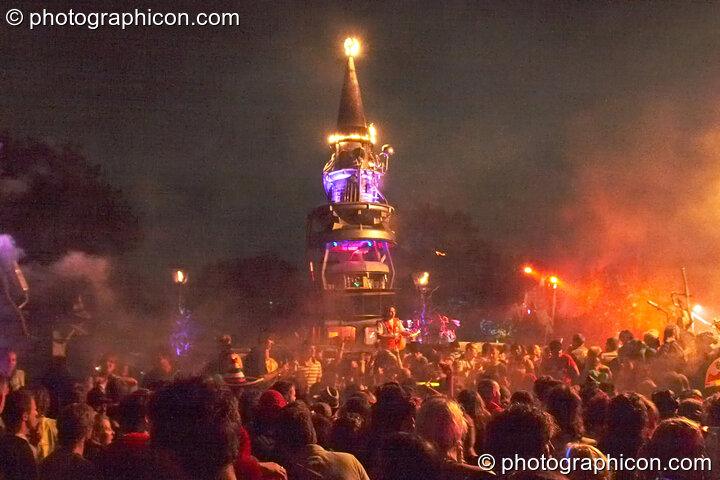 Fire and smoke leap from the Mutoid Waste's Arcadia Installation while Merv Pepler of Eat Static DJs in Trash City at Glastonbury Festival 2008. Pilton, Great Britain. © 2008 Photographicon
