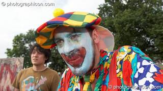 A man in scary clown costume at the Secret Garden Party 2008. Huntingdon, Great Britain. © 2008 Photographicon