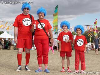 A family dressed as Thing characters from Dr. Seuss' The Cat in the Hat at the Secret Garden Party 2010. Huntingdon, Great Britain. © 2010 Photographicon