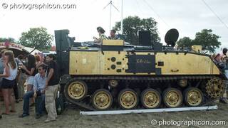 A DJ plays on the Tank stage (an armoured personnel carrier) at the Secret Garden Party 2010. Huntingdon, Great Britain. © 2010 Photographicon