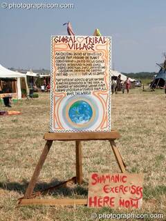 A sign advertising Shamanic exercises in the Global Tribal Village at Sunrise Celebration 2006. Yeovil, Great Britain. © 2006 Photographicon