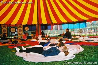 Peaceful meditation in the Healing Area at Kingston Green Fair 2003. Kingston upon Thames, Great Britain. © 2003 Photographicon
