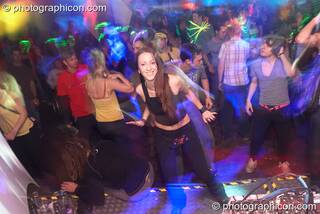 A woman dances in the Main room at the Liquid Records party. London, Great Britain. © 2007 Photographicon