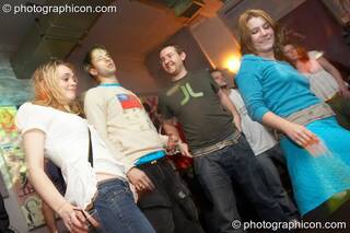 Mary, James, Dave, and Louise dance at Future Music Vol. 1. London, Great Britain. © 2007 Photographicon