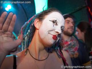 A man with painted clown's face in the Folktronica room at The Synergy Project. London, Great Britain. © 2008 Photographicon