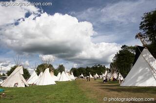 Giant cloud over an avenue of tipis at Big Green Gathering 2005. Burrington, Cheddar, Great Britain. © 2005 Photographicon