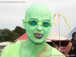 A man on a walkabout dressed as amphibians at Big Green Gathering 2006. Burrington, Cheddar, Great Britain. © 2006 Photographicon