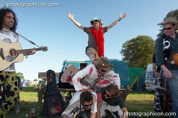 The Mad Cows form a human pyramid while performing in the Gamma Field at Big Green Gathering 2007. Burrington, Cheddar, Great Britain. © 2007 Photographicon