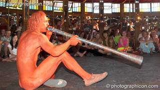 Naked Jovis plays a didgeridoo in the nude in the Pussy Parlure at Glade Festival 2006. Aldermaston, Great Britain. © 2006 Photographicon