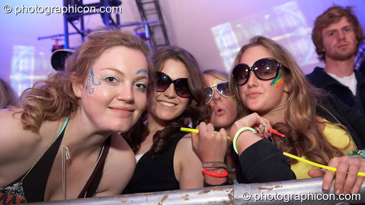 Four girl friends enjoy the music in the Glade Stage at Glade Festival 2007. Aldermaston, Great Britain. © 2007 Photographicon