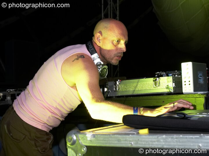 Side profile of Phil Hartnoll (ex Orbital) DJing on the Breaksday Stage at Glade Festival 2006. Aldermaston, Great Britain. © 2006 Photographicon