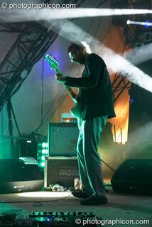 Mikael Simpson of Trentemoller (Poker Flat Recordings) performs amongst beams of coloured light on the Glade Stage at Glade Festival 2007. Aldermaston, Great Britain. © 2007 Photographicon
