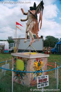 A statue of The God of Discard at Glastonbury Festival 2002. Pilton, Great Britain. © 2002 Photographicon