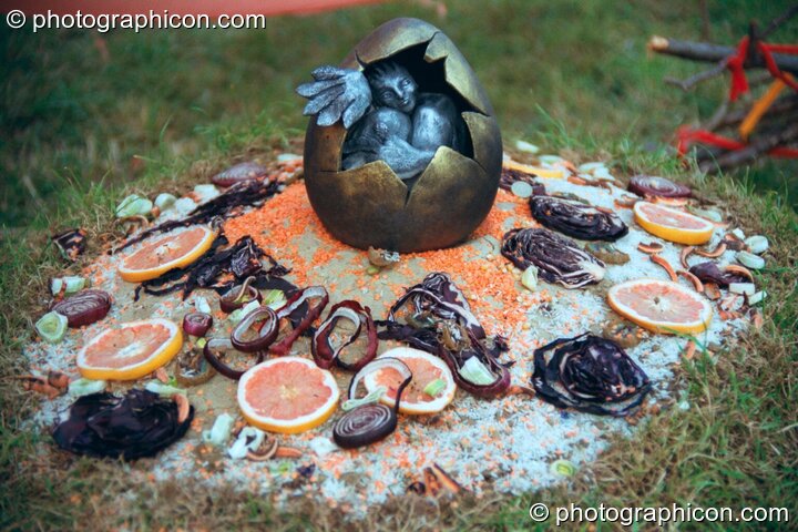 The egg shrine of a giant pheonix sculpture at Glastonbury Festival 2002. Pilton, Great Britain. © 2002 Photographicon
