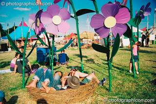 Metal flower sculptures in the Green Futures field at Glastonbury Festival 2003. Pilton, Great Britain. © 2003 Photographicon