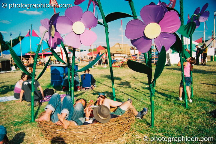 Metal flower sculptures in the Green Futures field at Glastonbury Festival 2003. Pilton, Great Britain. © 2003 Photographicon