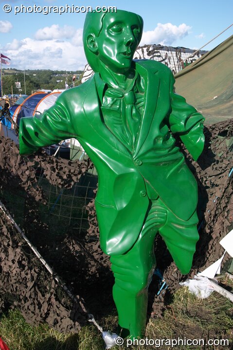 Sculpture of an armless man in the Green Future field at Glastonbury Festival 2004. Pilton, Great Britain. © 2004 Photographicon