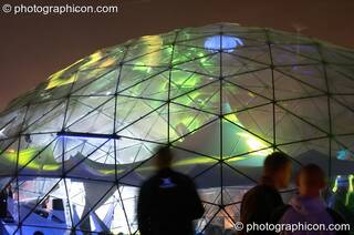 The exterior of the transparent idSpiral dome (Dance Village) by night at Glastonbury Festival 2005. Pilton, Great Britain. © 2005 Photographicon