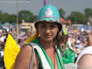 Woman Green Police officer wearing angel wings at Glastonbury Festival 2005. Pilton, Great Britain. © 2005 Photographicon