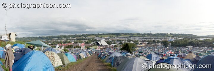 A panoramic view of tents camped near the pyramid stage at Glastonbury Festival 2007. Pilton, United Kingdom. © 2007 Photographicon