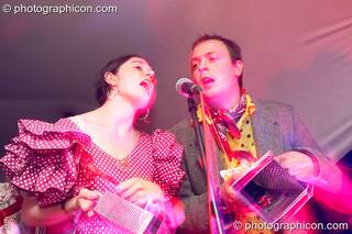 The Glitzy Baghags play cheese graters while performing on the Small World Solar Stage at Glastonbury Festival 2007. Pilton, United Kingdom. © 2007 Photographicon