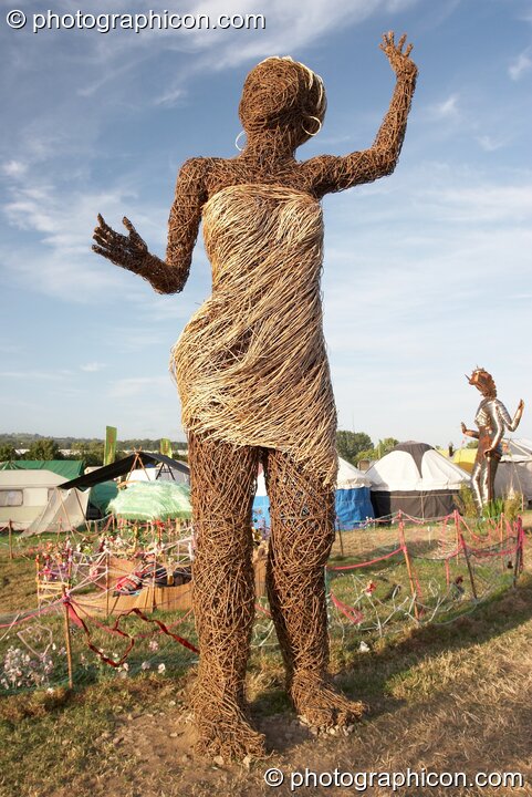 A large wicker statue of a woman in the Craft Field at Glastonbury Festival 2008. Pilton, Great Britain. © 2008 Photographicon
