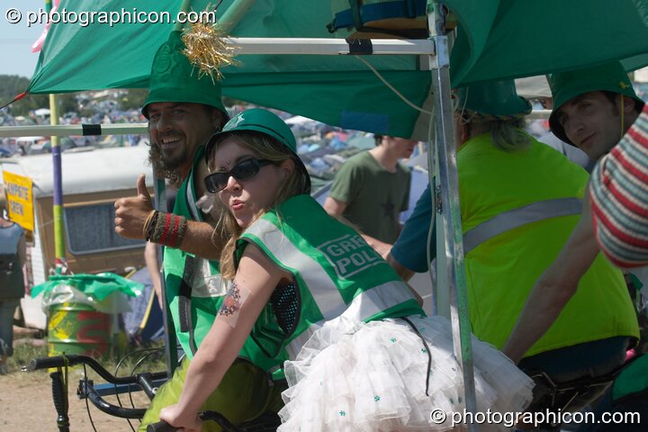 The Green Police pose with their Clean Green Support Machine at Glastonbury Festival 2004. Pilton, Great Britain. © 2004 Photographicon