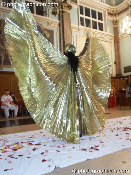 Solariss Abakari An-Ra perfoms an Egyptian Raqs Sharqui dance wearing a winged costume at the London Festival of Tantra 2008. Great Britain. © 2008 Photographicon