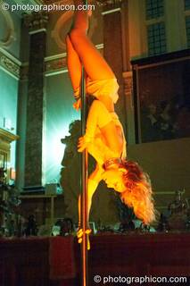 Ingrid Fluorotrash performs sensuous pole dancing at London Festival of Tantra 2009. Great Britain. © 2009 Photographicon