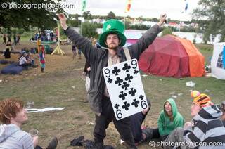 A man wearing a large playing card at the Secret Garden Party 2007. Huntingdon, Great Britain. © 2007 Photographicon