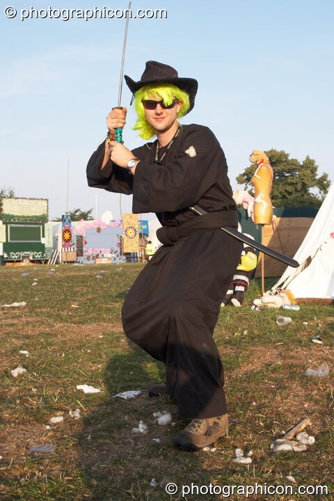 Good ninja Ant Yates defends the litter with his life at the Secret Garden Party 2008. Huntingdon, Great Britain. © 2008 Photographicon