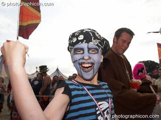 A happy kid dressed as a pirate has just won the dance-off competition at the Secret Garden Party 2008. Huntingdon, Great Britain. © 2008 Photographicon