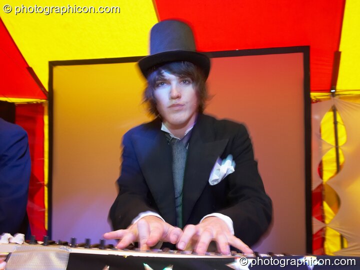 A man plays keyboards at the Secret Garden Party 2008. Huntingdon, Great Britain. © 2008 Photographicon