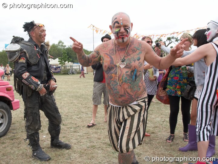 A tattooed man at the Secret Garden Party 2010. Huntingdon, Great Britain. © 2010 Photographicon