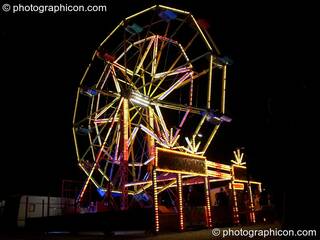 Night time view of the ferris wheel at the Secret Garden Party 2010. Huntingdon, Great Britain. © 2010 Photographicon