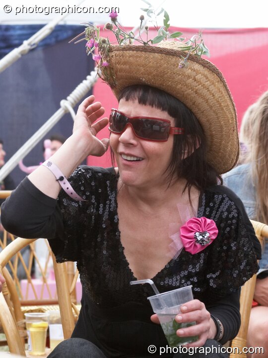 A woman in a wonky hat at the Secret Garden Party 2010. Huntingdon, Great Britain. © 2010 Photographicon