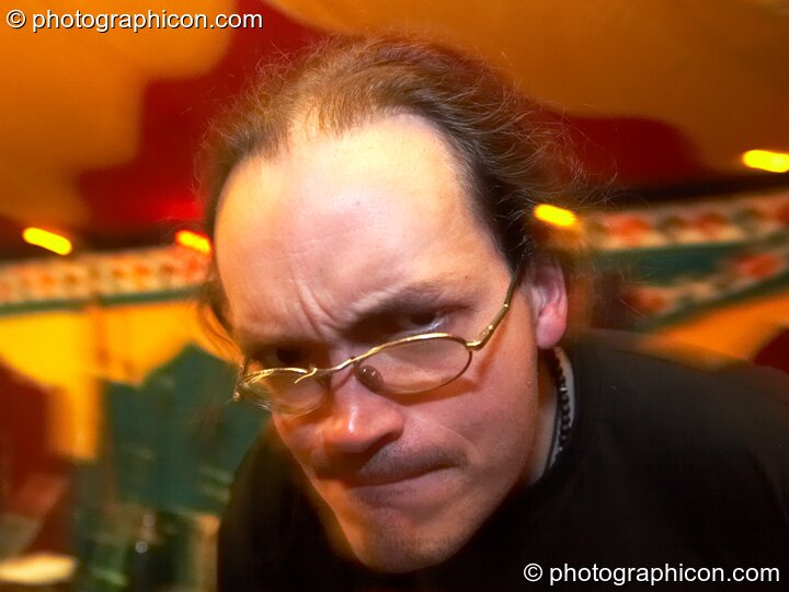 Pesh gives a wonky stare in the Lizard tent at the Secret Garden Party 2010. Huntingdon, Great Britain. © 2010 Photographicon