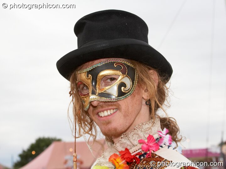 Doug dances in wonky costume and mask at the Secret Garden Party 2010. Huntingdon, Great Britain. © 2010 Photographicon
