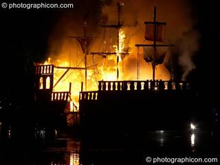 The burning Galleon ship on the lake at the Secret Garden Party 2008. Huntingdon, Great Britain. © 2008 Photographicon