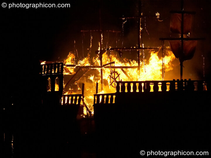 The burning Galleon ship on the lake at the Secret Garden Party 2008. Huntingdon, Great Britain. © 2008 Photographicon