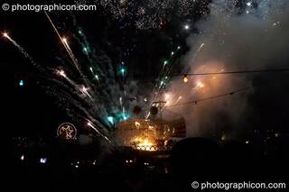 Fireworks erupt from the Blimp on the lake at the Secret Garden Party 2010. Huntingdon, Great Britain. © 2010 Photographicon