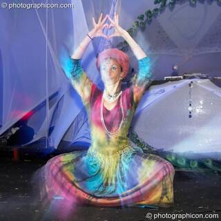 Sandra performing traditional Indian dance in the idSpiral dome at Sunrise Celebration 2006. Yeovil, Great Britain. © 2006 Photographicon