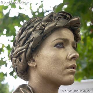 A woman impersonating a classical Greek statue at the Thames Festival 2004. London, Great Britain. © 2004 Photographicon