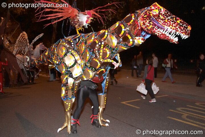 Dinosaur effigy by Shademakers &amp; Toca Rufar in the night carnival at the Thames Festival 2004. London, Great Britain. © 2004 Photographicon
