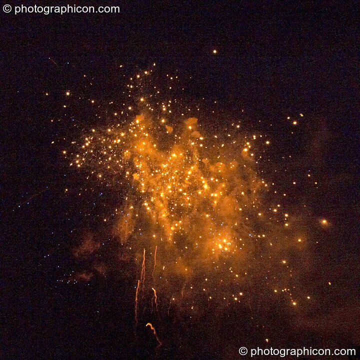 Fireworks by Groupe F produce an orange galactic effect in the sky above the Thames Festival 2004. London, Great Britain. © 2004 Photographicon
