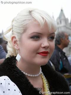 Portrait shot of a woman in 1950's black/white costume at the Thames Festival 2005. London, Great Britain. © 2005 Photographicon