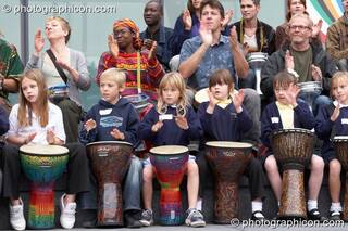Shool kids performing with Drum4Africa, a fundraising project for African children, at the Thames Festival 2005. London, Great Britain. © 2005 Photographicon